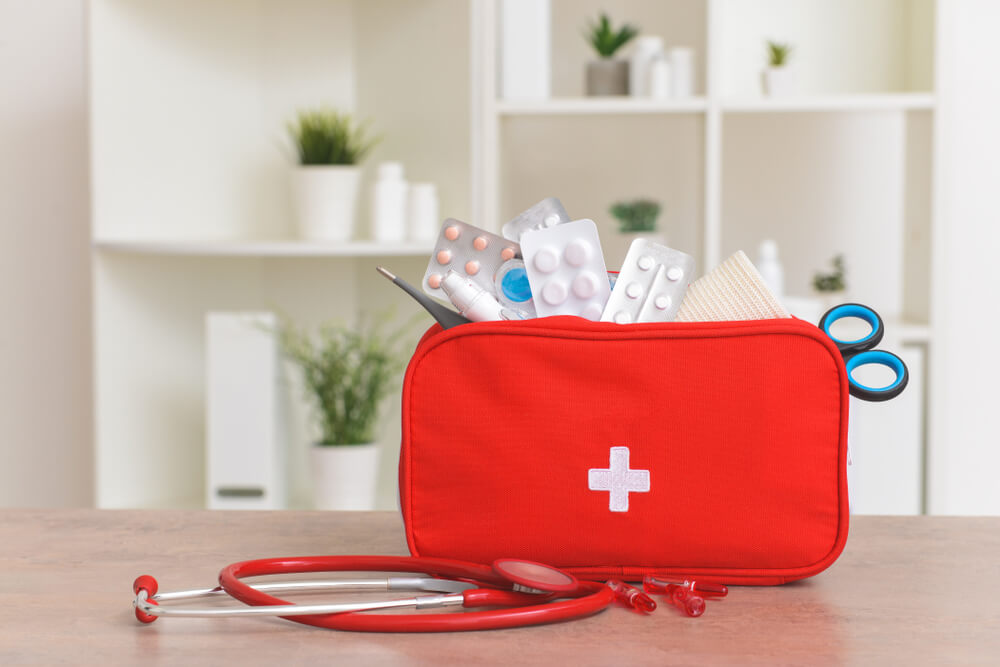 first-aid-kit-at-workplace-medicines-stethoscope